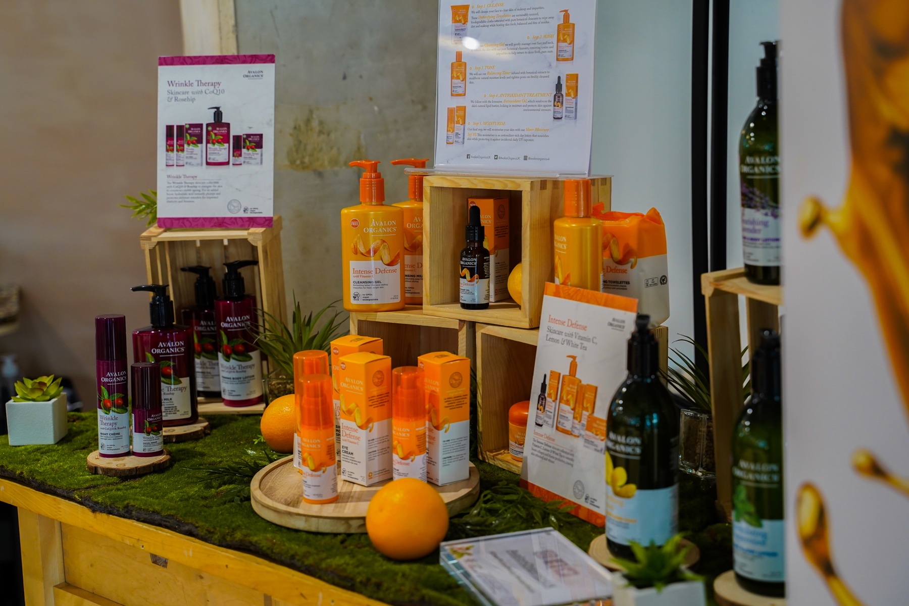 Carefully arranged skincare products on a branded display